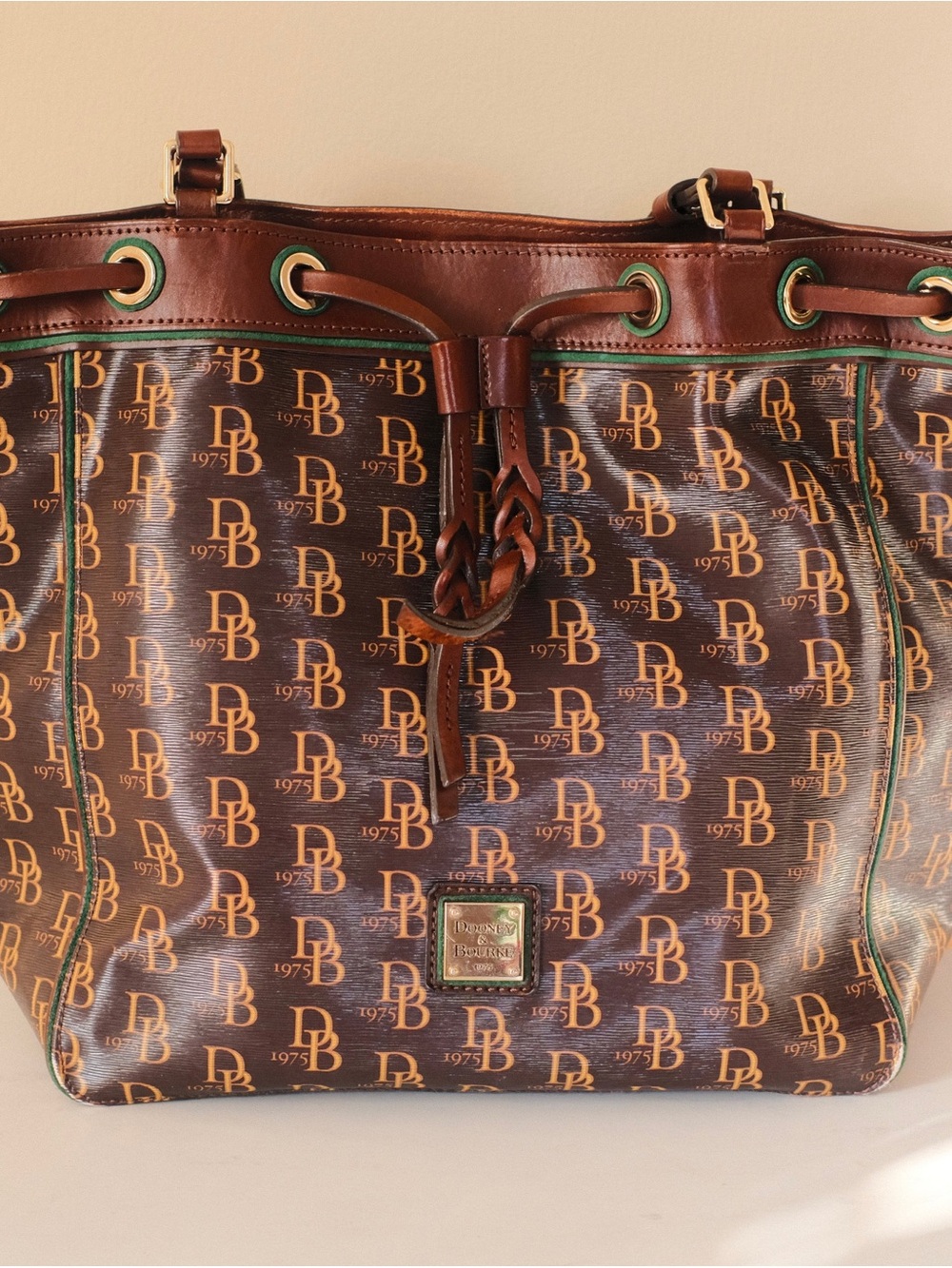 Dooney & Bourke Brown Logo Drawstring Tote with Green Trim